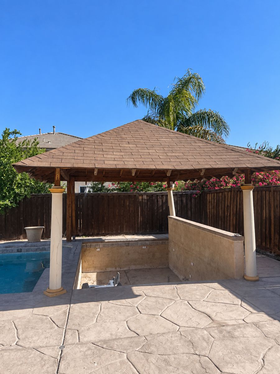 Wooden gazebo standing over a pool before demolition